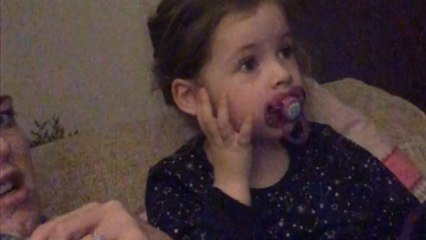 Little girl reacts emotionally as E.T. the Extra-Terrestrial is separated from his mum and spaceship