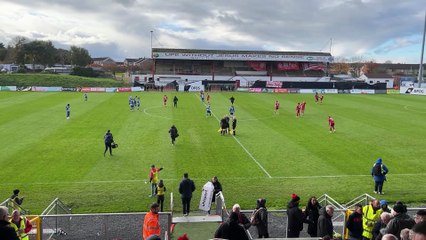 Players swapping sides ahead of kick-off in the Irish League between Portadown and Coleraine
