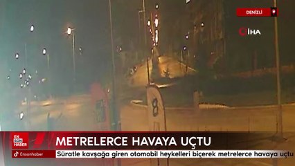 Denizli'de süratle kavşağa giren otomobil heykelleri biçerek metrelerce havaya uçtu