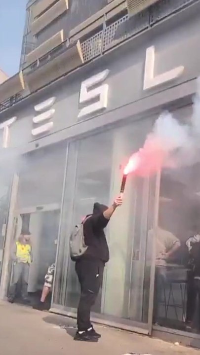 Protesters storm Tesla dealership in Paris amid nationwide strikes