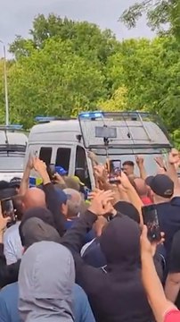 Police clash with anti-immigration protesters outside hotel housing asylum seekers in UK