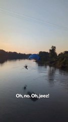 Paraglider crashes into telephone wires