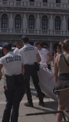 Activists display massive banner in Venice to protest Jeff Bezos' lavish destination wedding