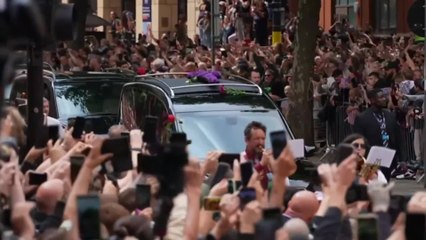 Grief-stricken Sharon Osbourne and kids put on united front at Ozzy's funeral procession
