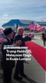 Trump Holds US, Malaysian Flags In Kuala Lumpur
