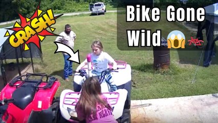 Kid on quad bike accidentally knocks Mom over after hitting the gas too hard