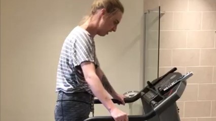 Woman struggles to keep balance as treadmill sends her into a chaotic gallop and trot routine