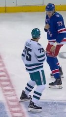 Matt Rempe and Ryan Reaves fight at center ice