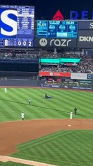 2 fans rush the field during Game 3 of ALDS
