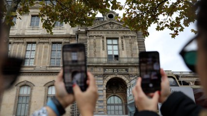 Louvre window becomes unexpected tourist attraction after $100m jewel heist