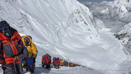 Hundreds of trapped hikers reach rescue point after snowstorm on Mount Everest