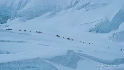 Nearly 1,000 hikers trapped on Mount Everest as heavy snow halts access