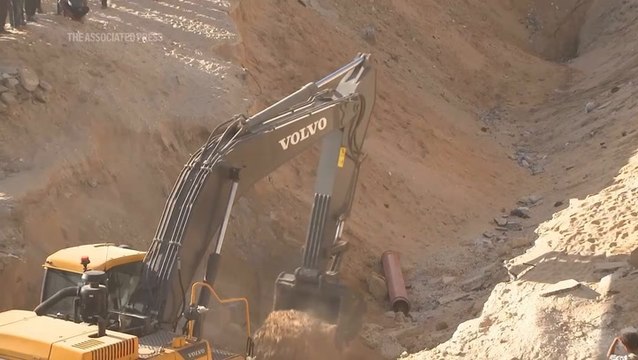 Excavators enter Gaza as Egypt and Red Cross widen search for bodies of hostages
