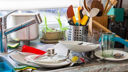 Why Letting Dishes Pile Up Could Be a Sign of Something Deeper, According to Psychology