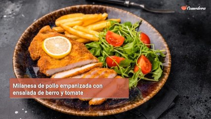 Milanesa de pollo empanizada con ensalada de berro y tomate