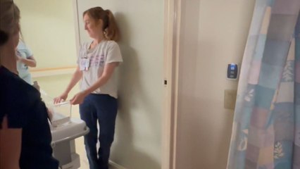 Emotional proposal takes place in hospital as couple celebrates birth of their newborn daughter