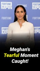 Meghan caught fighting back tears