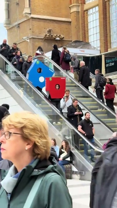 Giant Domino’s pizza boxes leave commuters in stitches at central London station