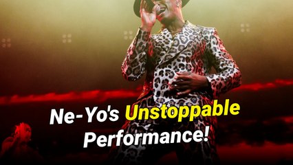 Ne-Yo pushes a fan off the stage without missing a note at a Japan concert