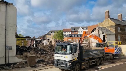 Watch as fire-damaged Grade II listed building in Northampton is DEMOLISHED