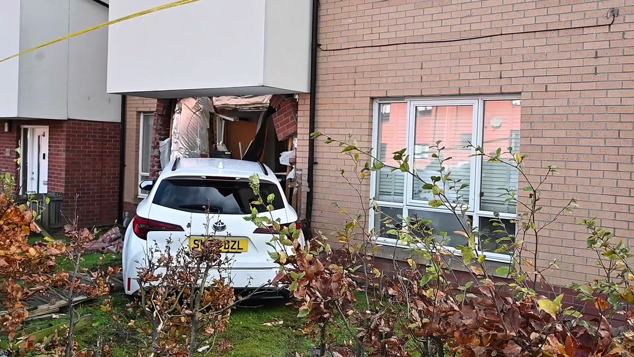 Car crashes into house in Glasgow