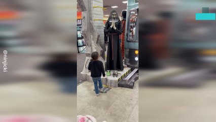 Little Girl Terrified of Halloween Decoration
