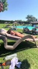 Man Knocks Sleeping Woman Off Bed While She Sunbathes