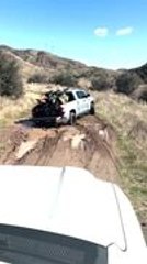 Truck Gets Trapped in Thick Mud as Driver Tries to Cross
