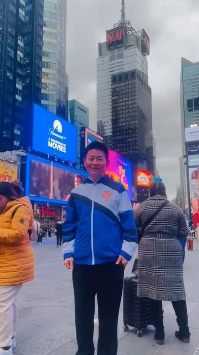 Nelson Wang, a Chinese-American representative from Roosevelt Island, spread his joy and enthusiasm to Times Square in Manhattan. The video was shot on October 28, 2025.