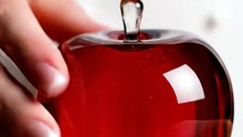 Cutting red apple in a glass ASMR
