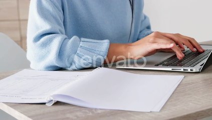 Laptop, paperwork and typing businesswoman in administration or human resources with invoice