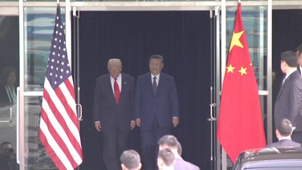 Xi, Trump walk out of meeting venue, shake hands