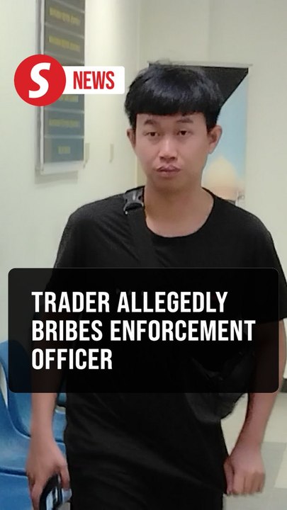 Trader, 28, charged with bribing city council officer
