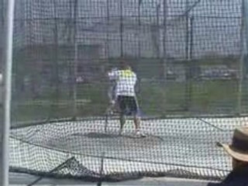 Athlé lancer disque John Godina 64.99m