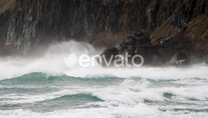 Powerful And Dangerous Waves Hitting The Rocky Cliff During Typhoon In Sandfly Bay, Dunedin, New Zea