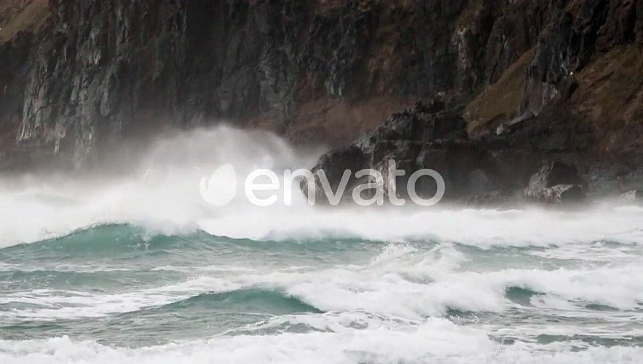 Powerful And Dangerous Waves Hitting The Rocky Cliff During Typhoon In Sandfly Bay, Dunedin, New Zea