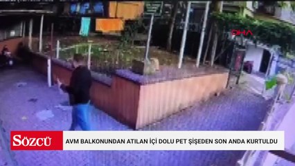 İtfaiyeci, AVM balkonundan atılan içi dolu pet şişeden son anda kurtuldu
