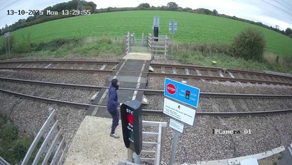 Teenager’s terrifying near-miss with oncoming train captured on video