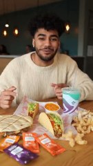 Guy does a Taco Bell food review