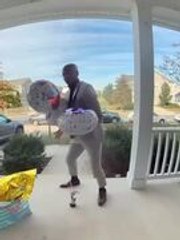 Man Bringing Gifts Slips and Falls at Door