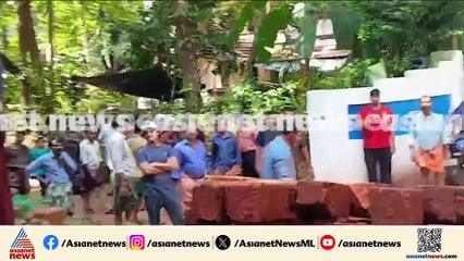 'ഒരു കൈ മാത്രമാണ് പുറത്തേക്ക് കണ്ടത്, മതിലിന്‍റെ അടിയില്‍ തൊഴിലാളി കുടുങ്ങി കിടക്കുകയായിരുന്നു'