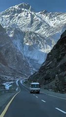 The Majesty of Silent Peaks: A Meditative Pause Before the Towering Mountain Ranges.