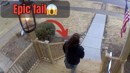 Girl slips and falls on black ice while heading out of home for school