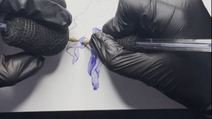 Artist breaks orthodox sketching rules by drawing with both hands simultaneously