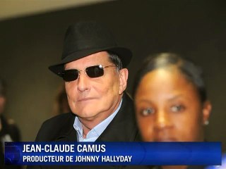 2009 – Jean-Claude Camus évoque l’hospitalisation de Johnny Hallyday | AFP