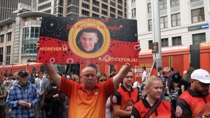 Police car driving through protest sparks tension at Indigenous deaths in custody rally