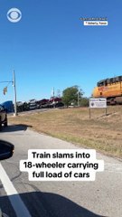 A train collided with an 18-wheeler carrying a full load of cars after it got stuck on tracks in Schertz, Texas on Sunday. No one was injured in the crash. #texas