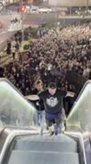 Fans Rush Up Escalator Chasing Autograph