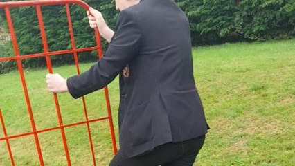 Boy rides a roll cage trolley to make it downhill but ends up falling badly