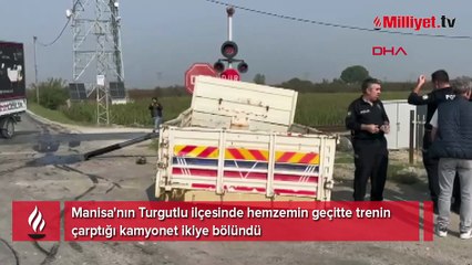 Trenin çarptığı kamyonet ikiye bölündü